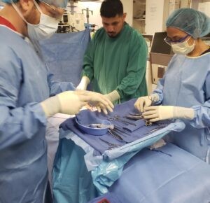 Image depicting doctors performing surgical procedures.