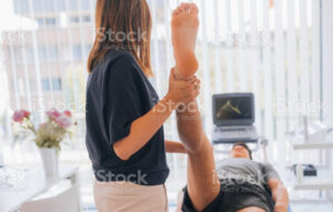 Physical Therapy Assistant: Image of a physical therapy assistant assisting a patient with exercises.