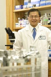 Portrait of Dr. David Da-I Ho, a Taiwanese-American medical doctor and HIV/AIDS researcher, known for his contributions to understanding the mechanism of HIV replication and championing combination anti-retroviral therapy.