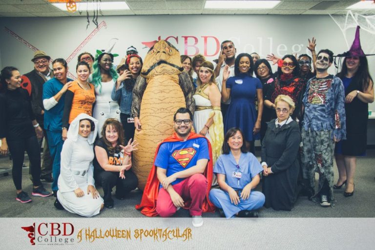 Group of CBD College students posing for a spooky photo during the Halloween event.