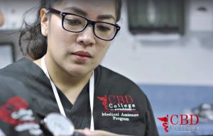 Photo of Marisela Esquivel, a student in the Medical Assistant Program at CBD College, highlighting her dedication to her education and pursuit of a career in healthcare.