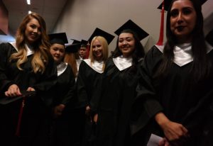 CBD College Winter Graduation Ceremony: Group photo of graduates celebrating together.
